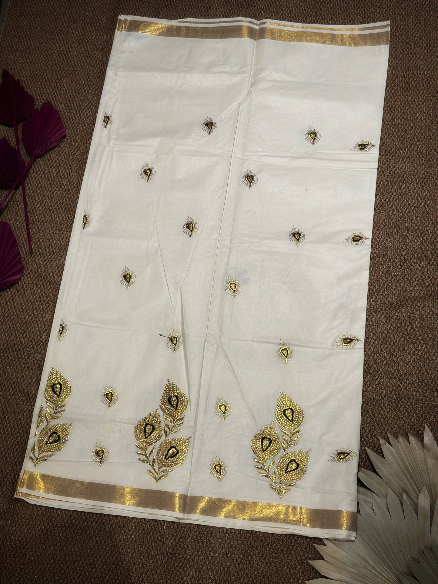 Golden Bloom Kasav Saree with Intricate Peacock Feather  Motifs